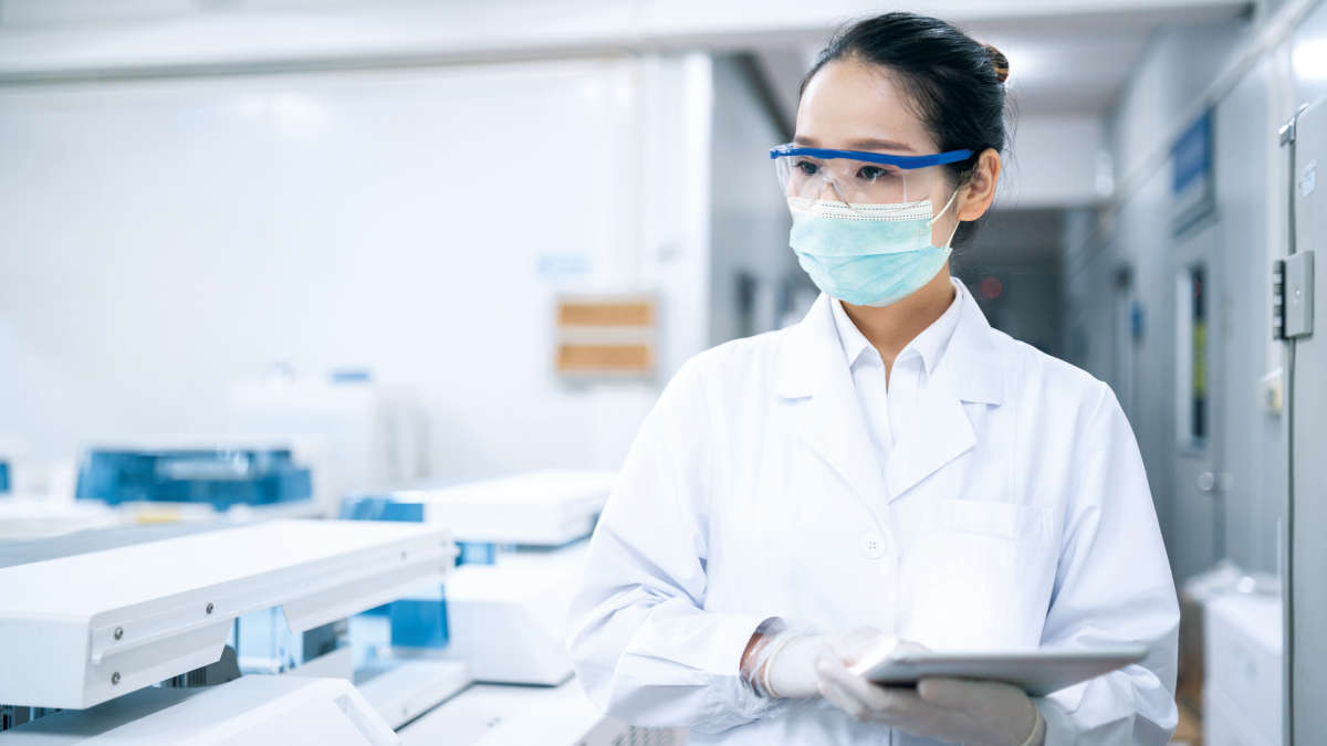 scientist, laboratory, labworker, check, reaserch, monitor, round, machine, instrument, female asian scientist in a lyb inviroment wearing a mask